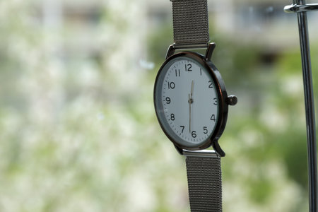 Women's wrist watch. Close-up. On a blurred background.