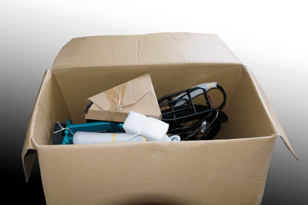 Folding bike packed in a cardboard box.の写真素材