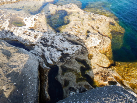 Rocky shore of the Caspian Sea. Cape Sagyndyk. Kazakhstan. Mangistau region. 13 June 2023 year.の写真素材