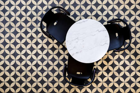 circle table and black chairの写真素材