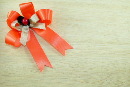Ribbon on wooden background. View from above