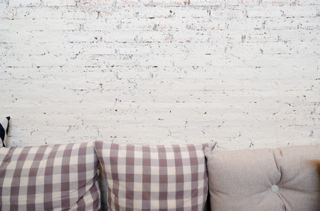 Simply pillows with sofa table inside the cafe.