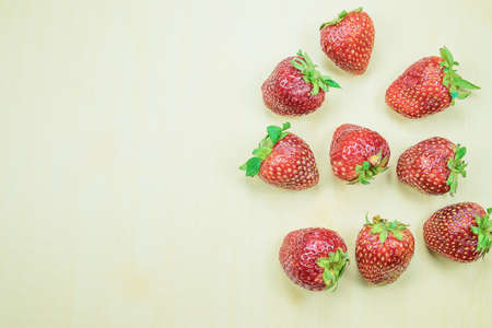fresh strawberries on wood tableの写真素材