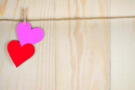 Heart shape hanging with a rope.