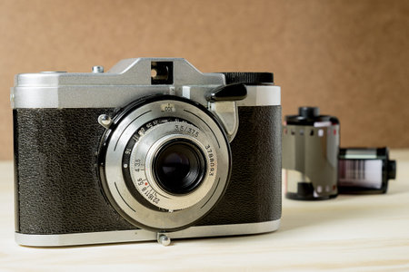 Vintage camera on wooden background. Vitage tone