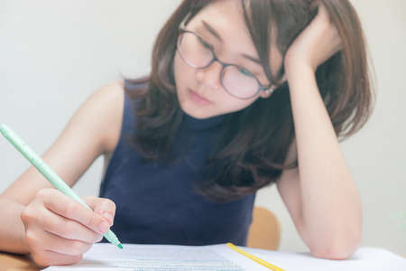 The woman is doing her job in the office.の写真素材