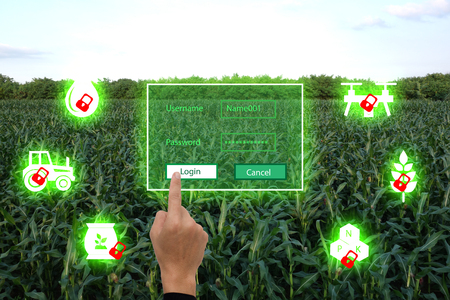 iot, internet of things(agriculture concept),smart farming,industrial agriculture.Farmer use the finger unlock the key and access to the system for control,management and monitor the fieldの写真素材