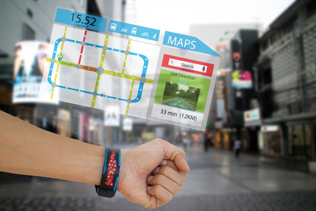 iot, internet of things,concept man use smart watch with augmented reality technology to show the map and the destinationsの写真素材