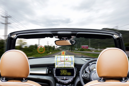 iot, internet of things smart car concepts, Head up display (HUD). Car use augmented reality to show the map, speed, limit speed sign and directionの写真素材