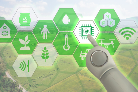 smart farming,industrial agriculture concept with artificial intelligence(ai). Smart Farmer use robot and  augmented reality technology to research,collect,control ,monitor and management in the fieldの写真素材