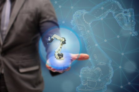 iot smart factory , industry 4.0 technology concept, Engineer show 3d robot in automation factory background with fake sunlight on operation line, Futuristic in the new trend technologyの写真素材
