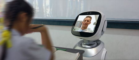 smart education industry futuristic concept, robotic assistant with artificial intelligence program in future use for teaching student with math, sing, dance, paint, and help them with languageの写真素材