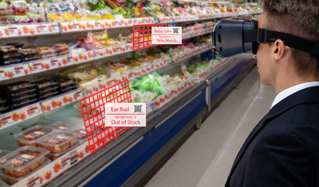 smart retail concept, A storeâs manager can check what data of real time insights into shelf status which report on a tablet from artificial intelligence(ai) smart glasses while scanning goods, priceの写真素材