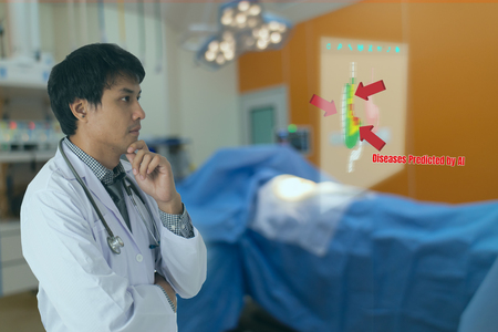 smart medical technology concept, doctor use glasses to use augmented reality to show the injury of stomach of the patient for analysis and find the way to treatment in surgery room at hospitalの写真素材