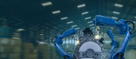 iot industry 4.0 technology concept.Smart factory using trending automation robotic arms with part on conveyor belt in operation line. Automotive manufacturing use it for precision, Repetition, intensの写真素材