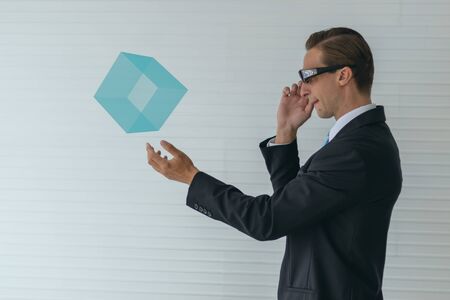 business man use augmented mixed virtual reality technologyの写真素材
