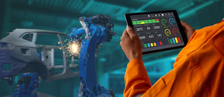 smart factory which use futuristic technology which combine big data, iot, 5g, machine deep learning, automation robot, augmented mixed virtual reality, digital twin, artificial intelligenceの写真素材