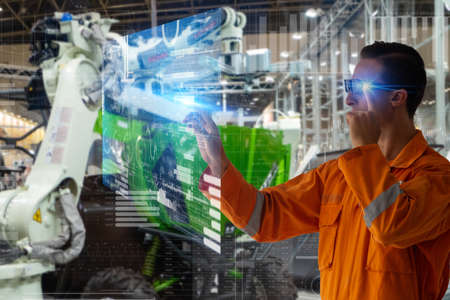 smart factory which use futuristic technology which combine big data, iot, 5g, machine deep learning, automation robot, augmented mixed virtual reality, digital twin, artificial intelligenceの写真素材