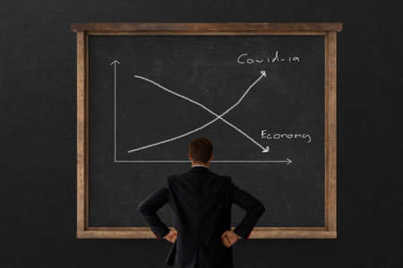 business man looking on black board excellent rating voting by customer experience with hand putting highest rate five star. best services concept. copy spaceの写真素材