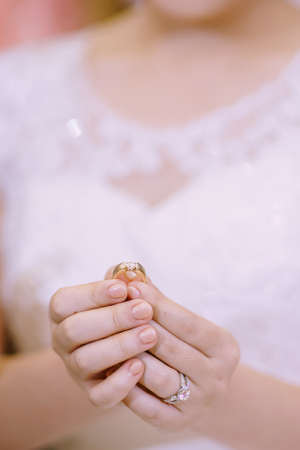 Hand of lover are wearing a ring on her wedding dayの写真素材