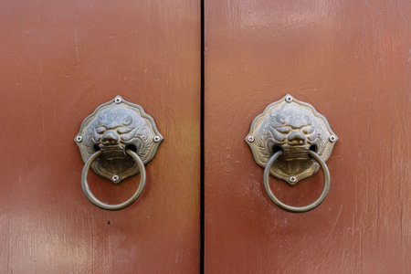 The Antique brown door is closing