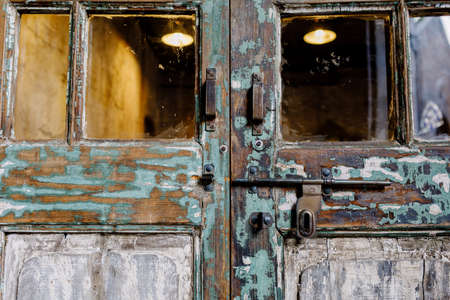 Bolts with Vintage wooden doorの写真素材