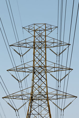high voltage pole There is a sky backdrop.