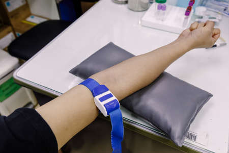 The procedure use needle of Blood collection from the patient's arm...の写真素材