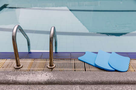 Blue foam board in swimming poolの写真素材