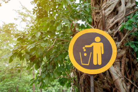 Signs suggest places for garbage dumping in parks.の写真素材