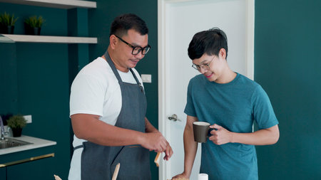 Two lovers cook together, and when they're done they both stand together for coffee and sandwiches,...