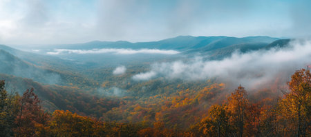 A panoramic view of the mountain range, with mist rising from its peaks and autumn-colored forests at their feet. The sky is painted in hues of blue and white, creating an enchanting atmosphere. Shot on a Canon EOS R5 mirrorless camera using a high-resolution lens. --ar 34:15 --v 6.1 Job ID: 1d330360-3ddf-41a9-991b-fad9aa6b9bb8の素材