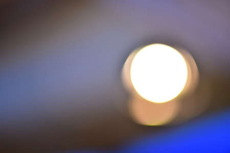 Colorful bokeh with neon lights at night time, motion movement with traffic light in the city on car windshield view, blurred light background. Speed fast with driving car. Long exposure.の写真素材