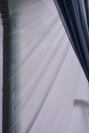 White and gray curtain background, photo studio fabric screen backdropの写真素材