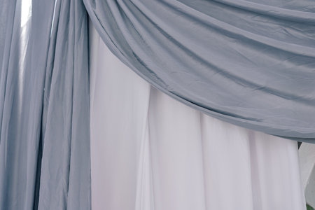 White and gray curtain background, photo studio fabric screen backdropの写真素材