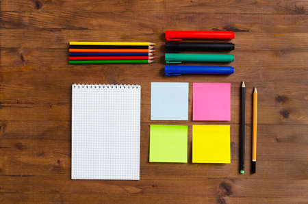 Set of office supplies on old wooden tableの写真素材