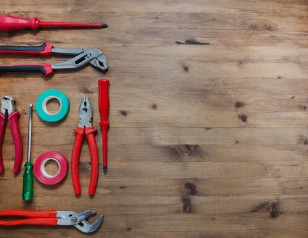 Set of tools on old wooden table