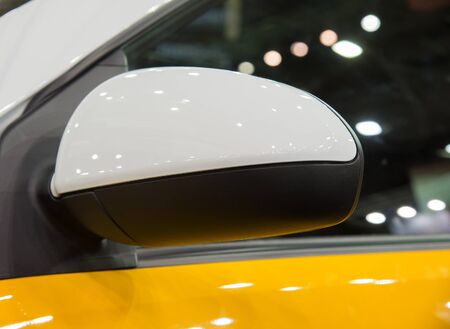 Rear view mirror of new multicolored car