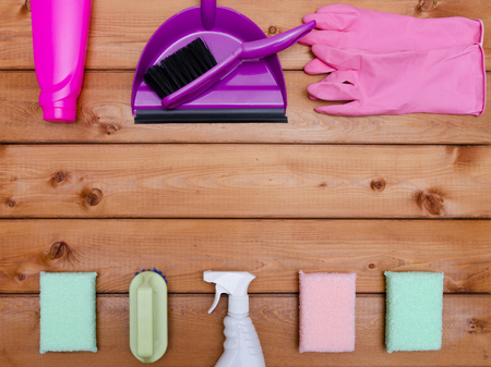 Set of variety cleaning supplies on wooden table, top viewの写真素材