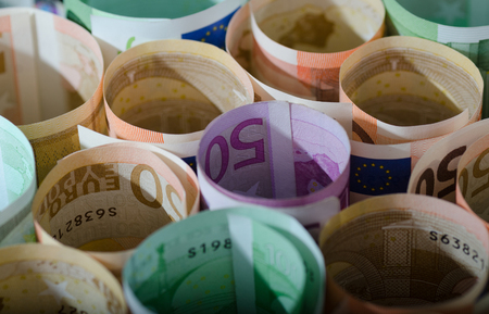 European paper money bills in rolls.  Financial concept.の写真素材
