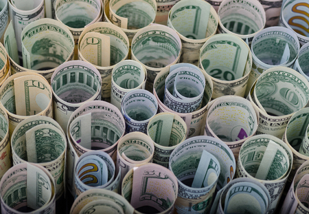 Dollar banknotes rolls. Business and financial concept.の写真素材