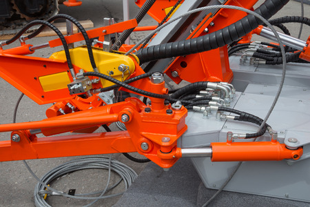 Detail of hydraulic bulldozer piston excavator arm. Closeup of a construction machinery hydraulic equipment.の写真素材