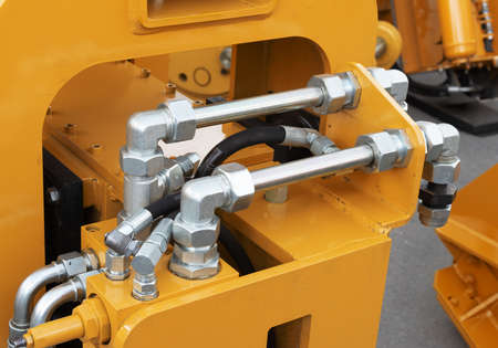 Hydraulic pressure pipes and connection fittings of industrial equipment. Hydraulic system of...