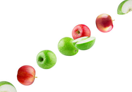 Apples are green and red halves and whole ones fly in space. Excellent retouching quality and high resolution.の写真素材