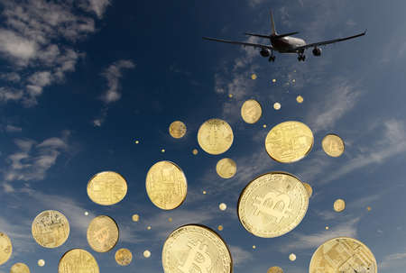 Receding plane scatters bitcoins in blue cloudy skyの写真素材