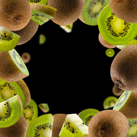 Perfectly retouched kiwis, whole halves and slices fly and levitate in space. isolated on blackの写真素材