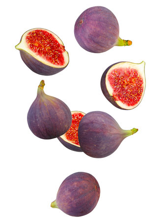 Whole and halved figs form an abstract figure in space. Isolated on white. Full depth of field.の写真素材