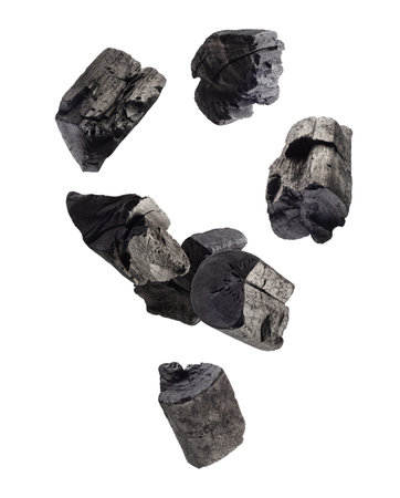 Charcoal forms an abstract figure in space. Isolated on whiteの写真素材