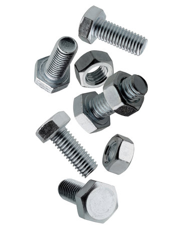 Set of bolts and nuts falling in space. Isolated on whiteの写真素材