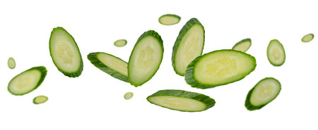 Cucumber slices in oval serving form for table setting fly and levitate in space. Isolated on whiteの写真素材